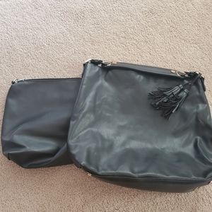 Black leather tote bag with makeup bag